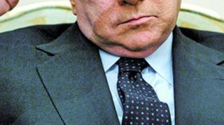 Berlusconi a dat drumul la mitocanii pe Angela Merkel: "E o curva grasa pe care nu o f...e nimeni"