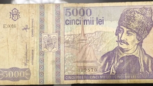 Mai ai această „comoară” acasă? La ce preț se vinde o bancnotă de 5.000 de lei din anul 1993, cu chipul lui Avram Iancu