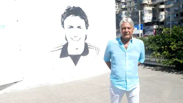 Un craiovean talentat! După ce a pictat chipul lui Ilie Balaci, acum l-a pictat și pe Sorin Cârțu pe unul dintre zidurile Craiovei. FOTO