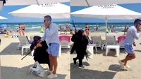 Scandal pe plaja White Beach! Administratorul a fost lovit și alergat de o femeie cu un baston