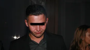 Imagini incredibile! Un fost politist clujean acuzat de relatii homosexuale s-a dezlantuit cu arma intr-o bucatarie!