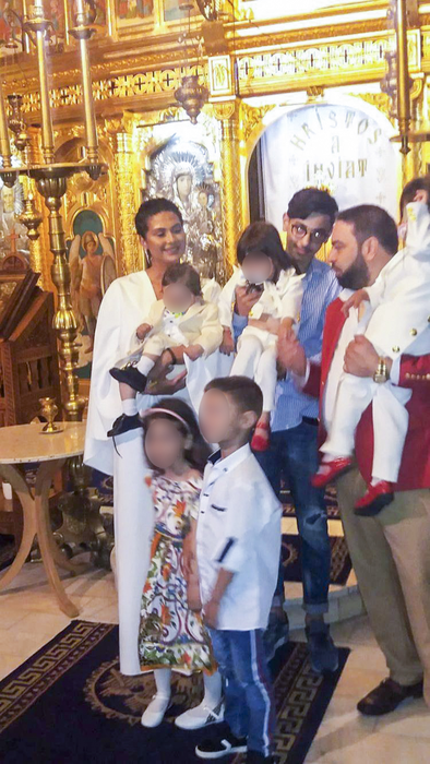Florin Salam și Roxana Dobre la botezul micuțului lor  Simon
