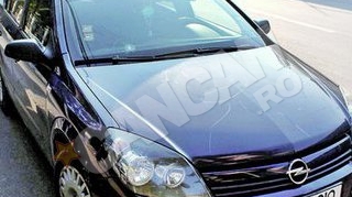 Surpriza neplacuta pentru un preot din Iasi! S-a trezit cu un drac pe capota