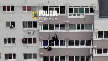 Intervenție dramatică în Sectorul 6! Mascații au escaladat un bloc pentru a salva o femeie