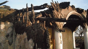 Imaginea pe care nu o va uita niciodată! Ce a fotografiat o femeie pe un perete, după ce i-a luat foc casa