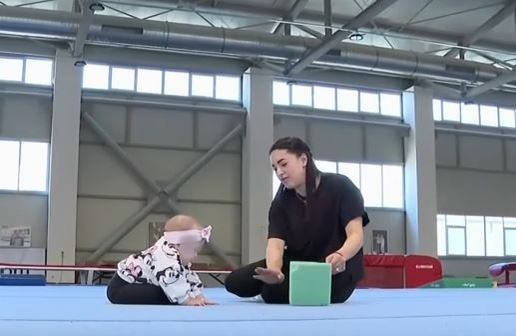 Larisa Iordache și-a dus fiica de câteva luni în sala de gimnastică. Sursă: Captură TV