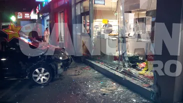 Mort de gelozie, a vrut să-şi lovească soţia cu maşina, dar a ratat şi a intrat într-un supermarket din Capitală!