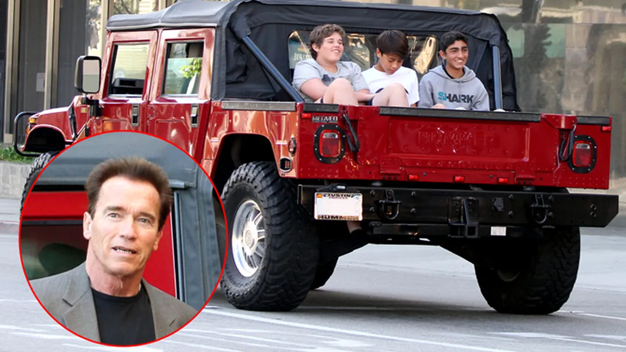 Arnold isi transporta fiul in spatele Hummer-ului