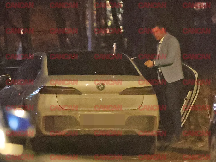 Călin Donca, însoțit de o brunetă misterioasă.