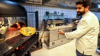 E ireal ce a găsit o femeie în pizza comandată de la un restaurant celebru. Nici măcar nu a fost despăgubită