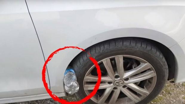 Romanii, în alertă! Ce înseamnă când găsești o sticlă la roata mașinii! Mare atenție!