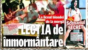 O adolescenta s-a pozat, zambitoare, culcata pe un sicriu