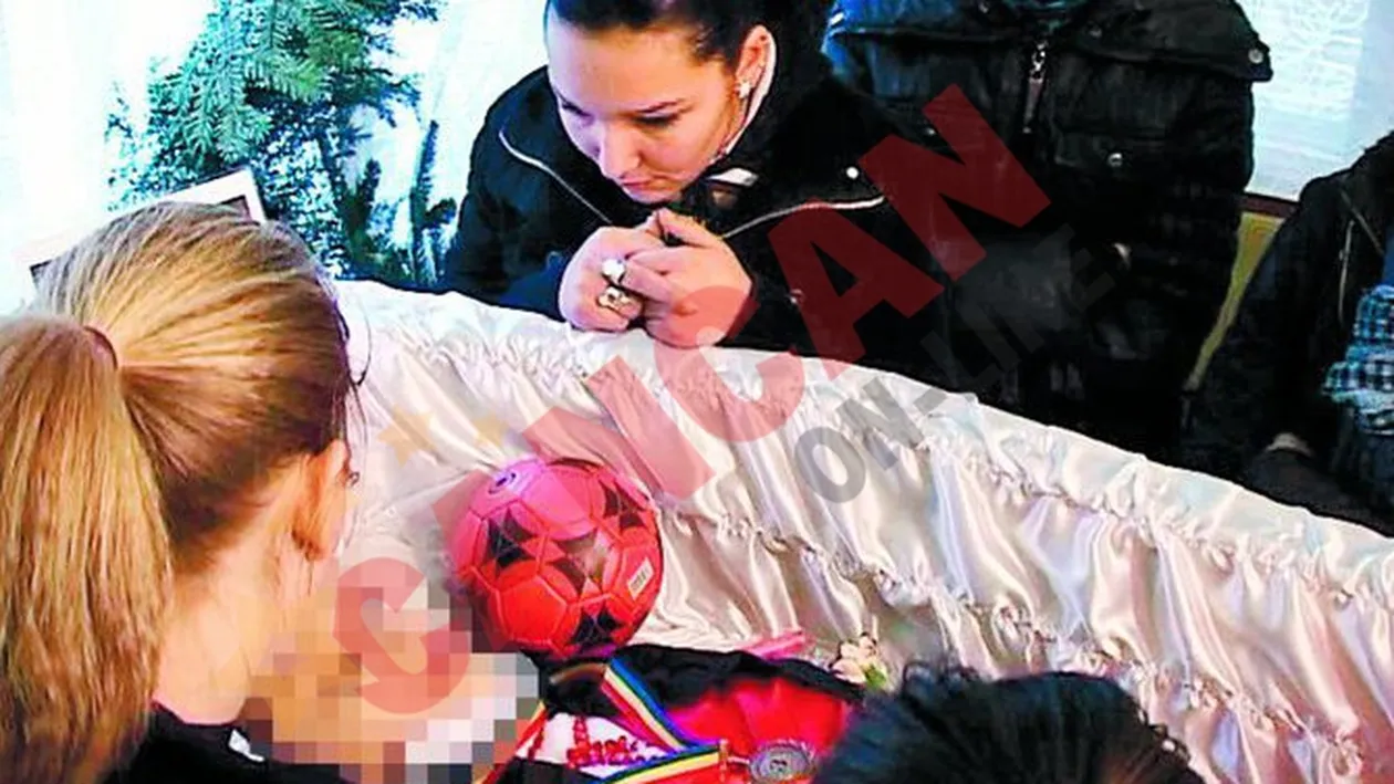 Au ingropat-o cu mingea de handbal si medaliile