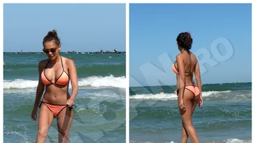 Imagini fierbinţi! O cunoscută prezentatoare tv de la noi, model la plajă
