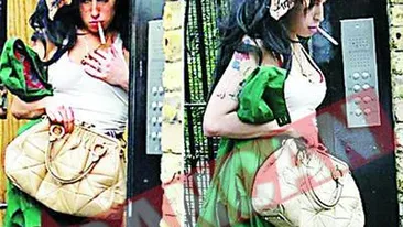 Amy si-a stins tigara pe fata