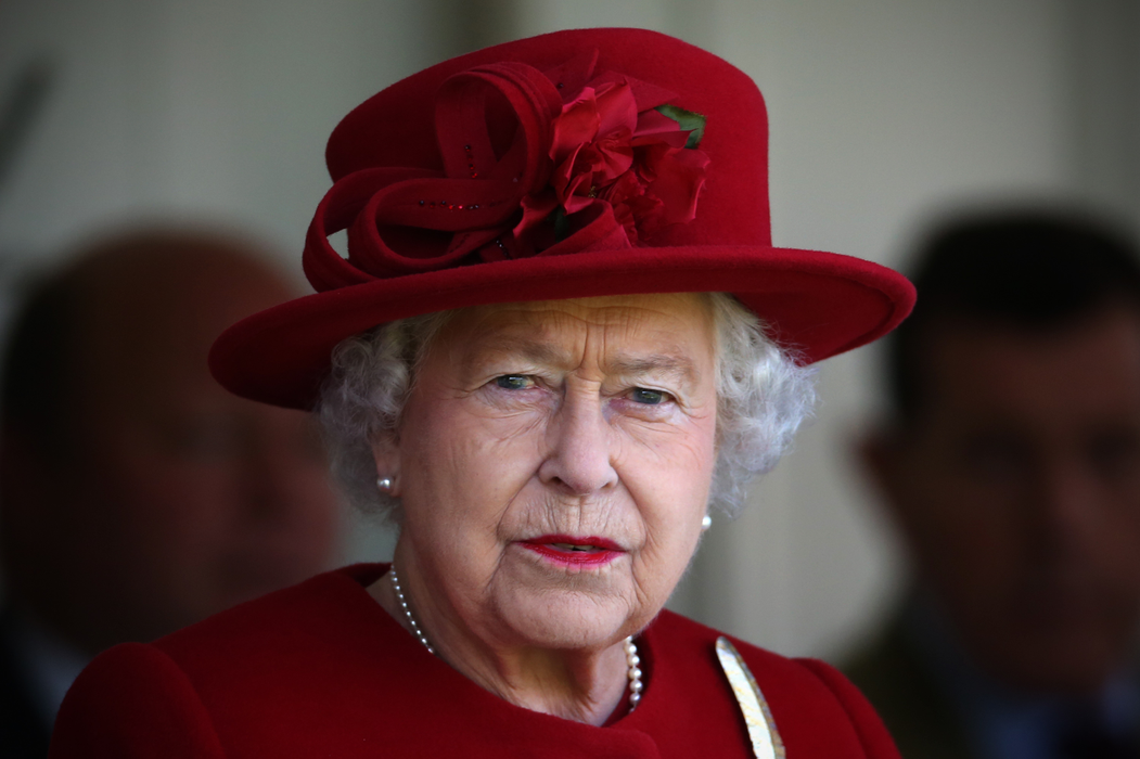 BRAEMAR, SCOTLAND - SEPTEMBER 05:  Queen Elizabeth II looks on as she arrives at the Braemar Gathering on September 5, 2015 in Braemar, Scotland. There has been an annual gathering at Braemar, in the heart of the Cairngorms National Park, for over 900 years.  The current gathering, in the form of a High land Games and run by the Braemar Royal High land Society  (BRHS), takes place on the first Saturday in September and sees competitors in Running, Heavy Weigh ts, Solo Piping, Ligh t Field and Solo Dance watched by around 16000 spectators. This year the BRHS commemorate their bi-centenary.  Members of the Royal family often attend the event and Her Majesty the Queen is Chieftain of the Braemar Gathering.   (Photo by Carl Court/Getty Images)