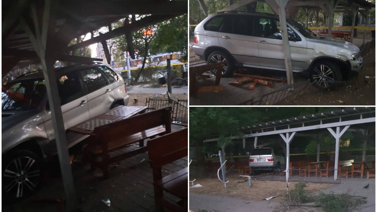 “Performanță” uimitoare a unui șofer cu BMW. A sărit peste un trotuar imens și s-a înfipt în mesele din colțul șahiștilor din Militari