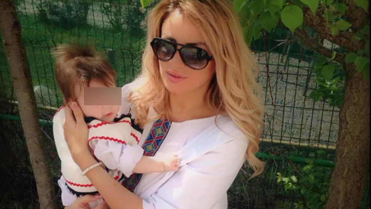 SÂNZIANA BURUIANĂ, apariţie sexy! Ce rochie a purtat la botezul fiicei sale