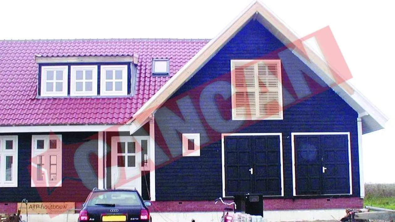Case la rosu, din lemn, cu doar 11.400 EURO