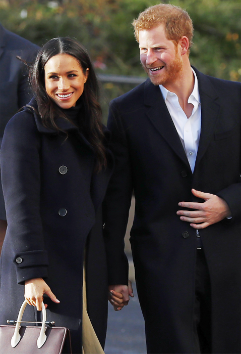 NOTTINGHAM, ENGLAND - DECEMBER 01:  Prince Harry and his fiancee, US actress Meghan Markle, visit the Nottingham Academy as part of their first official public engagements togetheron December 1, 2017 in Nottingham, England.  Prince Harry and Meghan Markle announced their engagement on Monday 27th November 2017 and will marry at St George's Chapel, Windsor in May 2018.  (Photo by Dan Kitwood/Getty Images)