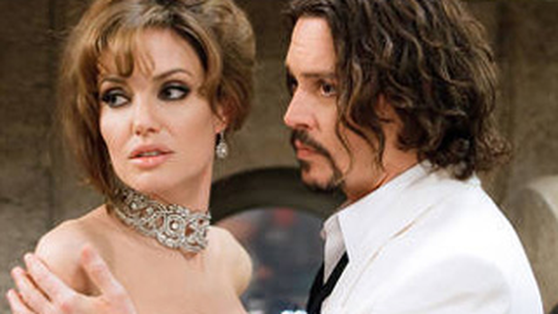 Angelina Jolie, motivul despartirii dintre Johnny Depp si Vanessa Paradis!