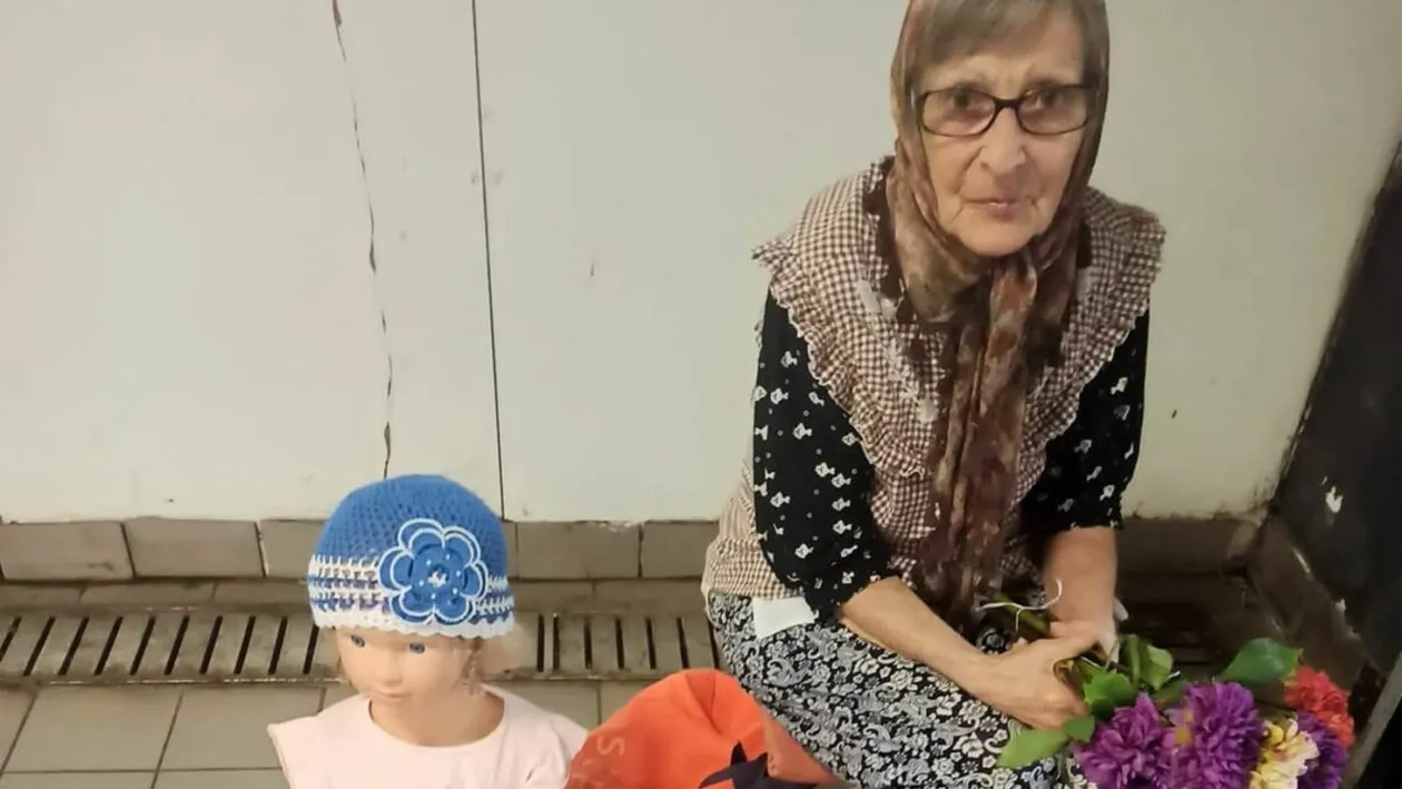 Povestea emoționantă a pensionarei din imagine. Din ce face bani, la ieșirea din metroul de la Piața Sudului din București