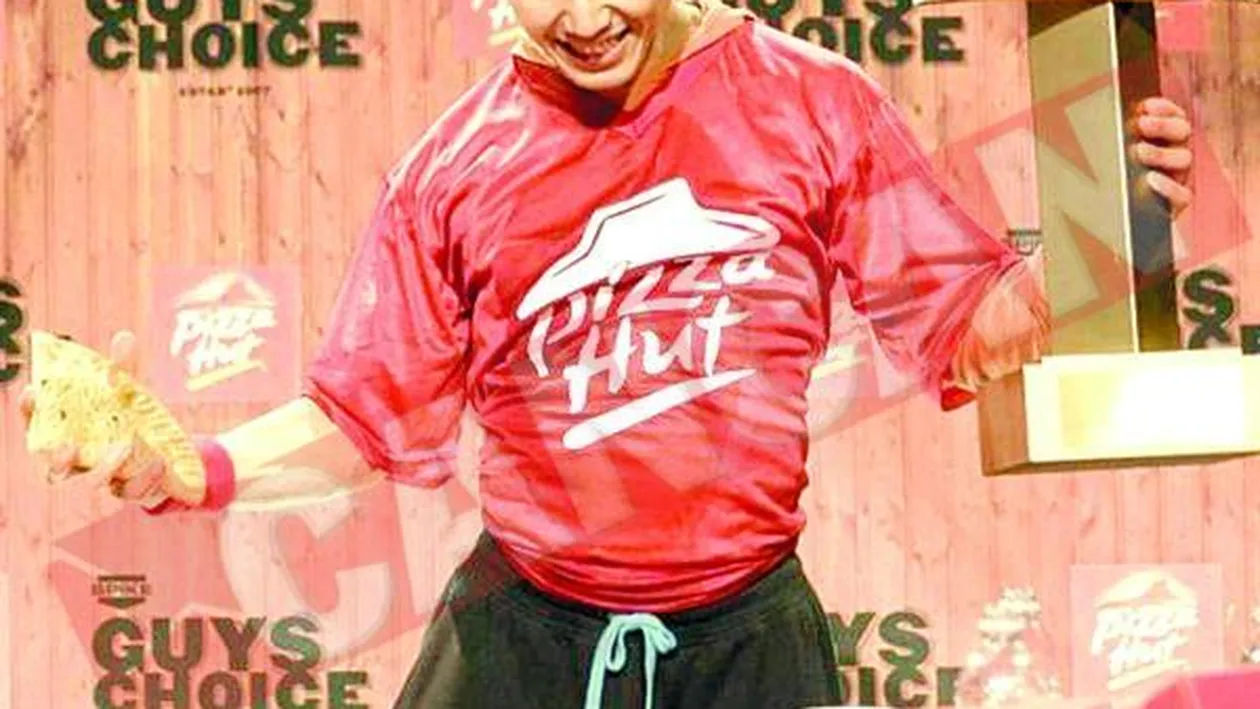 A mancat 2,6 kilograme de pizza in sase minute