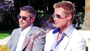 Jolie il uraste pe Clooney
