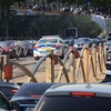 Mașină de poliție versus BMW. O scenă desprinsă din filme, pe linia de tramvai