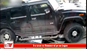 S-a urcat cu Hummer-ul pe un Logan