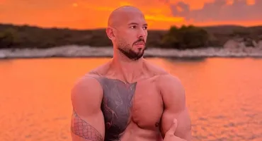 Andrew Tate, în tandrețuri cu o blondă misterioasă! S-au sărutat cu patos în miezul zilei. VIDEO