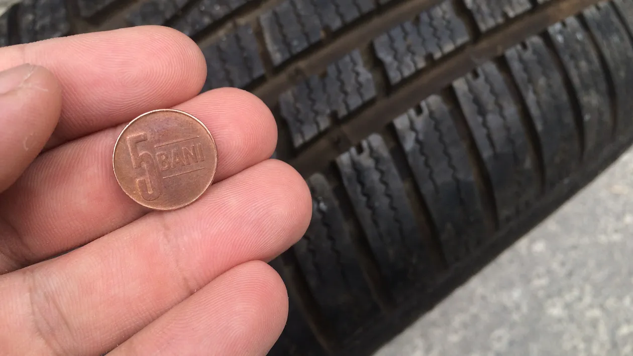 Cum verifici uzura unui cauciuc de iarnă second-hand cu o monedă de 5 bani
