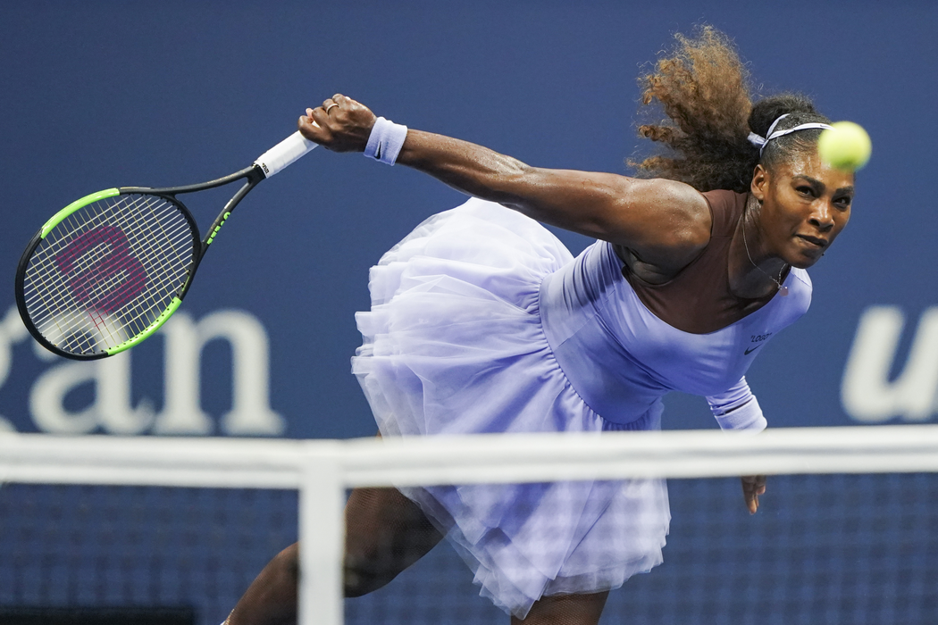Serena Williams of the US hits a return to Anastasija Sevastova of Latvia during their Women's Singles Semi-Finals match at the 2018 US Open at the USTA Billie Jean King National Tennis Center in New York on September 6, 2018. / AFP PHOTO / EDUARDO MUNOZ ALVAREZ