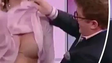 VIDEO / Incident JENANT în direct! Un prezentator TV i-a ridicat bluza colegei şi a arătat lumii întregi ce ascunde în sutien