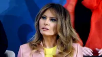 S-a aflat de ce pozează Melania Trump mereu cu gura deschisă!