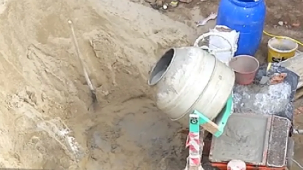 ”Meșterul Manole” din Gorj și-a băgat soția cu capul într-o găleată cu beton