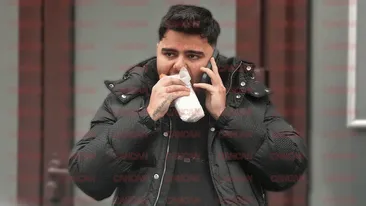 L-am prins pe nepregătite. Alberto Guță s-a luptat cu un sandviș uriaș în plină stradă