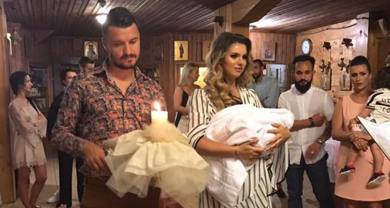 Constantin Budescu şi soţia sa, Mădălina, la botez