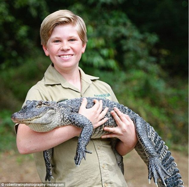 Fiul lui Steve Irwin are acum 13 ani şi e un celebru fotograf