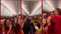 Pasagerii unui avion au început să țipe de fericire după ce pilotul i-a sfătuit să își schimbe tricourile