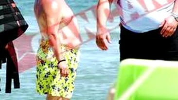 Adi Minune, pazit de bodyguard pe plaja