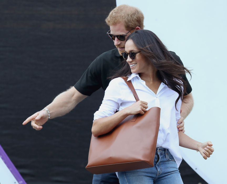 TORONTO, ON - SEPTEMBER 25:  Prince Harry (L) and Meghan Markle (R) attend a Wheelchair Tennis match during the Invictus Games 2017 at Nathan Philips Square on September 25, 2017 in Toronto, Canada  (Photo by Chris Jackson/Getty Images for the Invictus Games Foundation )