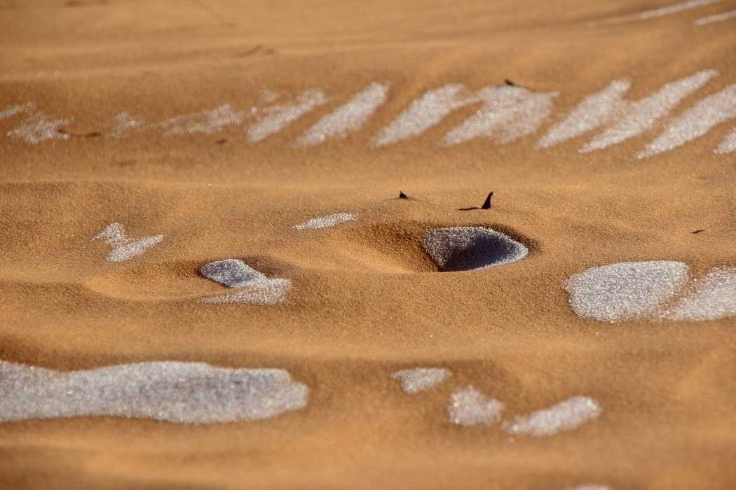 Picture dated January 8th shows a covering of snow and ice in the Sahara Desert near Ain Sefra in northwestern Algeria.SNOW has fallen on the SAND in the SAHARA Desert after temperatures dropped below freezing.Photographers took incredible pictures of rare SNOW and ICE in the Saharan desert in northwestern Algeria yesterday (Sat).The ice created stunning patterns in the sand after the area saw a sprinkling of snow fall unexpectedly.
Rare snow in Saharan desert, Algeria - 10 Jan 2022,Image: 651687779, License: Rights-managed, Restrictions: , Model Release: no, Credit line: Profimedia