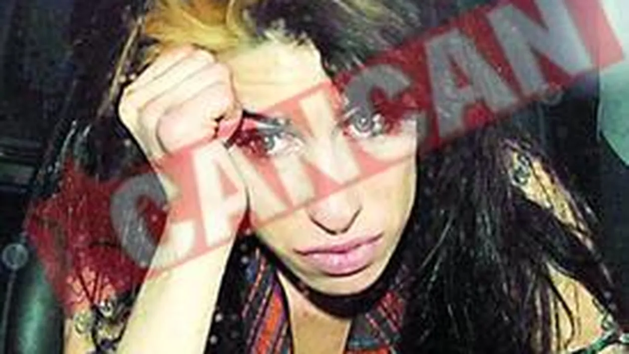 Amy s-a luat la bataie cu paparazzii