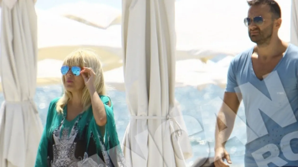 Elena Udrea, mai sexy ca niciodata! Uite cum a fost surprinsa alaturi de iubitul ei la malul marii