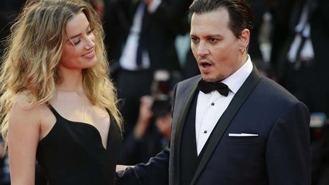 Un nou scandal zguduie Hollywood-ul! După ce a anunţat că divorţează de JOHNNY DEPP după doar 15 luni de căsnicie, AMBER HEARD l-a acuzat de violenţă domestică
