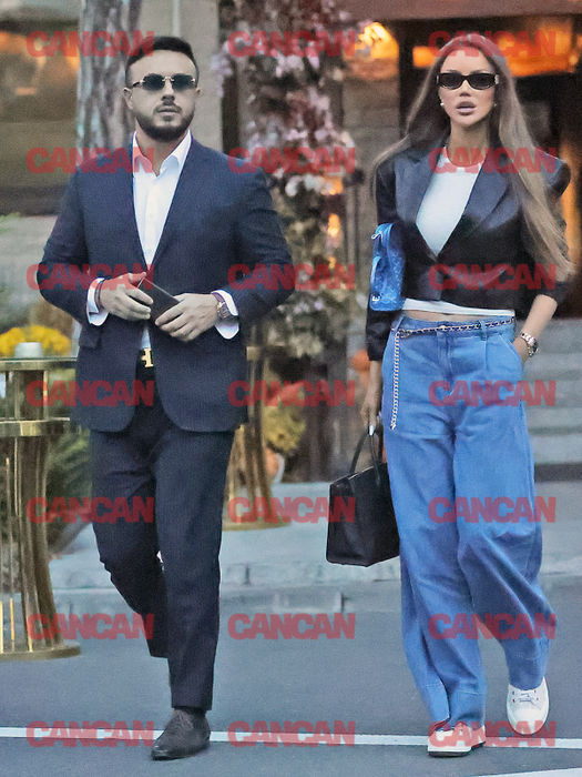 Gabi Bădălău, la costum, iar Bianca în blugi