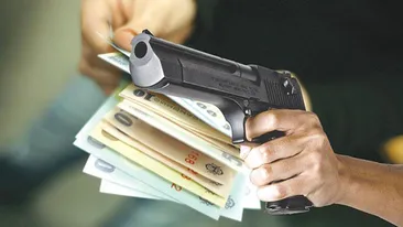 Jaf armat la o bancă din Capitală, hoţul a plecat cu bani