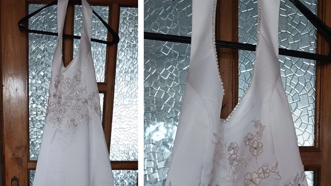 O româncă și-a scos rochia de mireasă la vânzare, cu doar 10 lei: "Prețul e negociabil!"