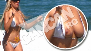 Sanziana Buruiana, ravasita dupa un preludiu excitant in mare! S-a frecat de iubitul ei cu sanii pe afara